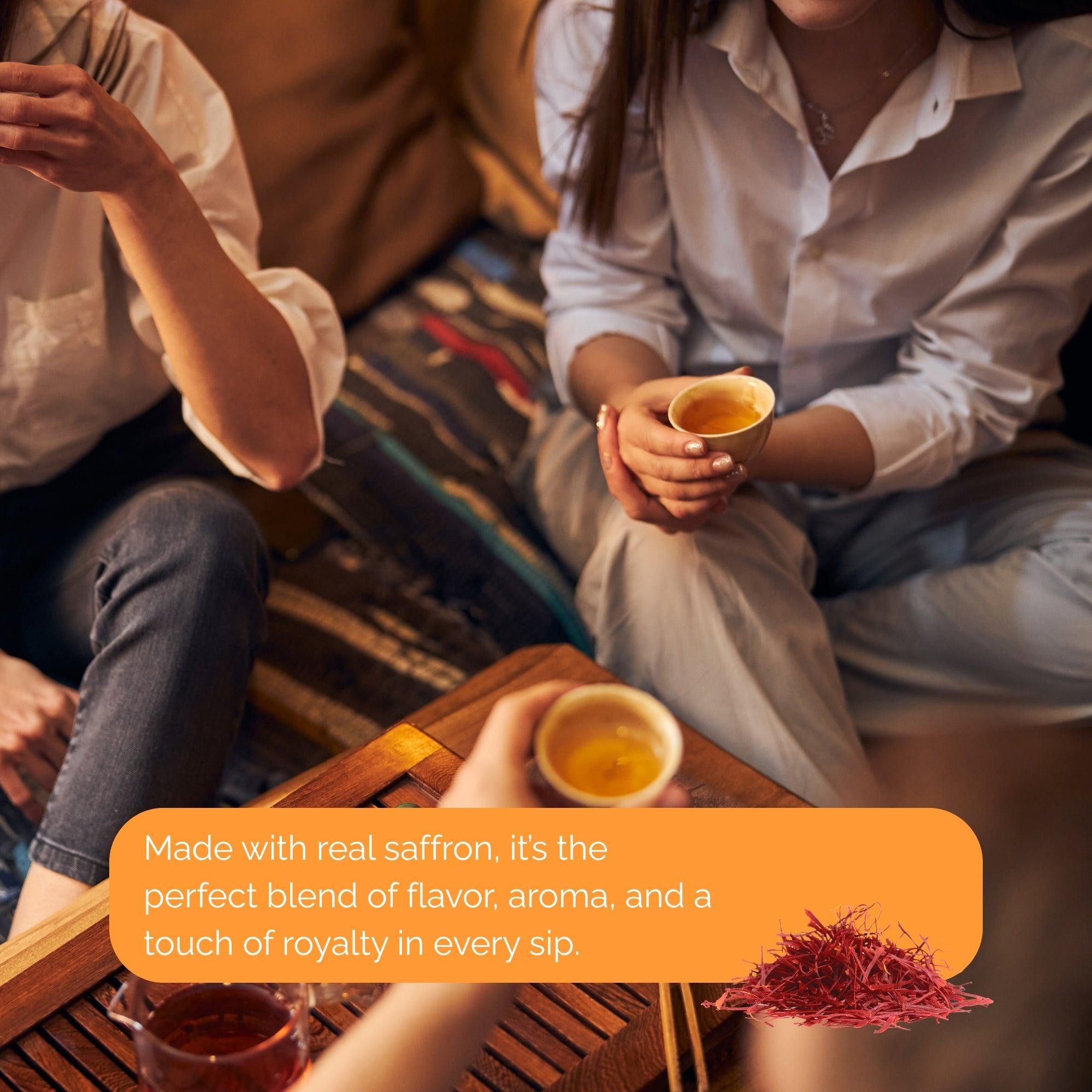 People enjoying a warm cup of kesar saffron tea in a cozy setting highlighting real saffron flavor